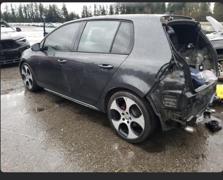 2011 VW GTI at auction with rear damage