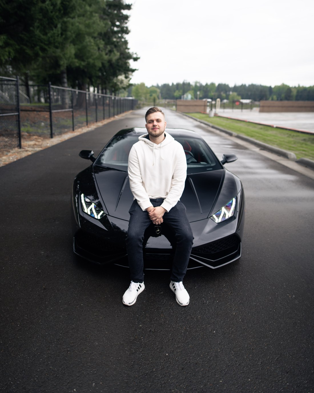 Tim Davidenko, founder of BackYardBoyz, with his Lamborghini